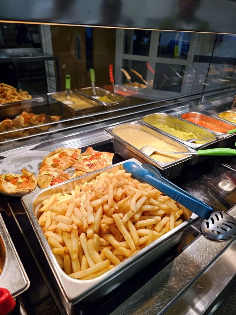 Chips and sides on the hot counter